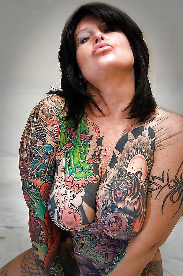 Tattooed Huge Tits.