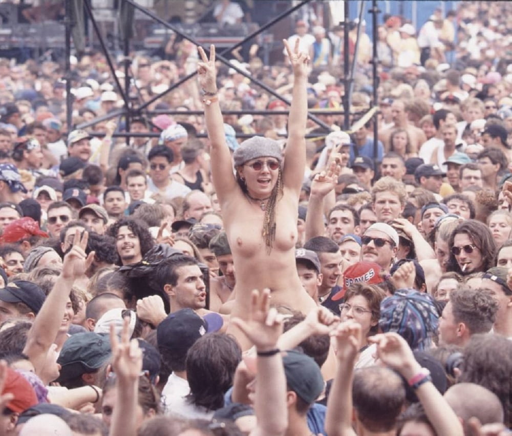 Naked crowd surfer