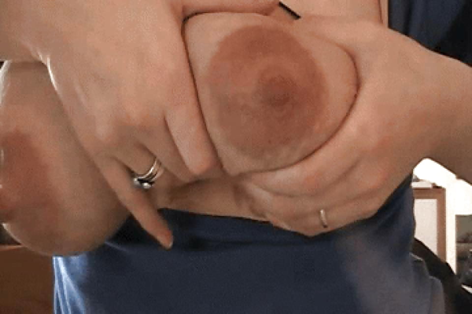 Rubbing big tits