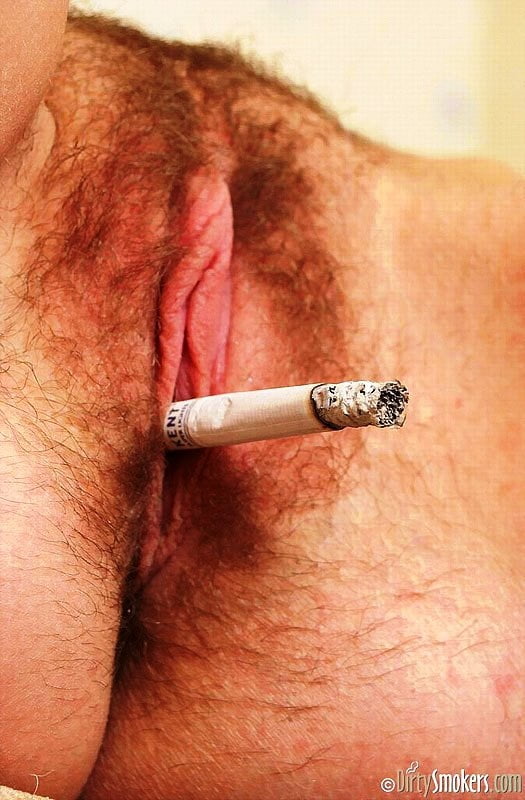 Smoking cigarette with vibrator pussy