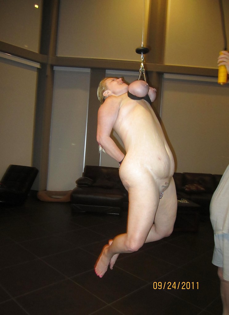 Hung By Her Huge Tied Tits - Woman hung by her tits. woman hung...