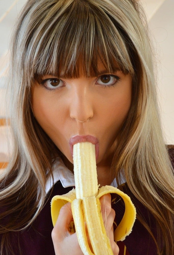 Japanese girl sucking banana