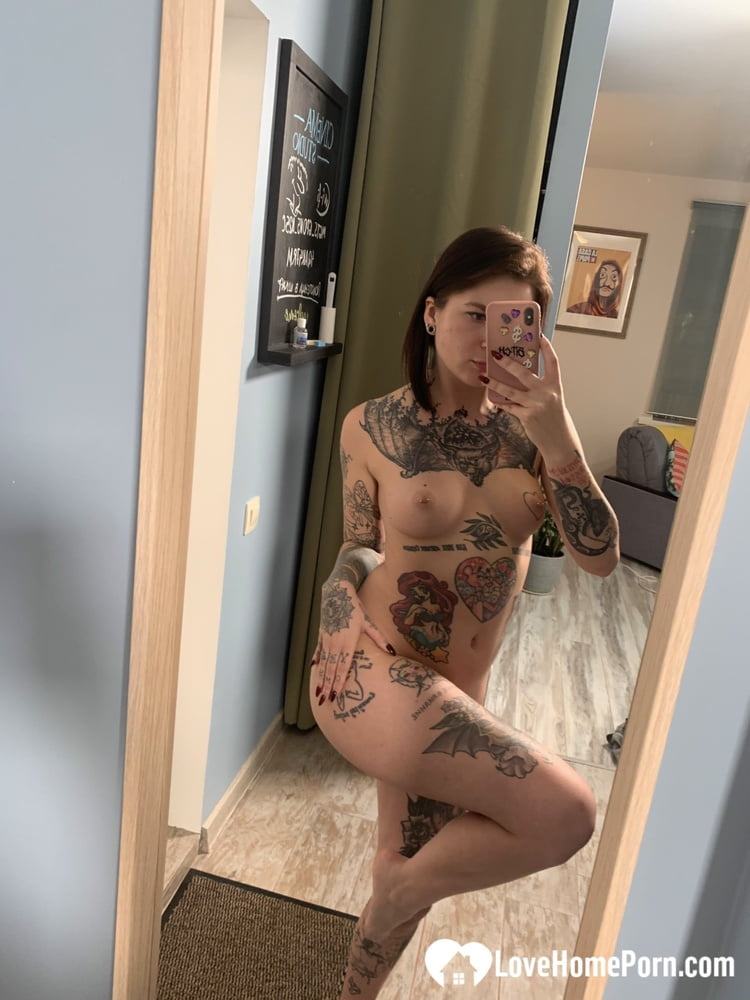 Tattooed babe taking selfies with amazing angles - 27 Photos 