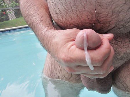 stroking my cock in the pool