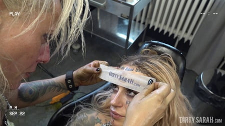 dirty sarah bitch got her forehead tattooed         