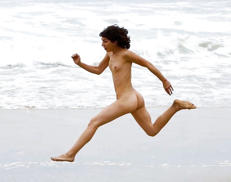 Nude Woman Jumping For Joy