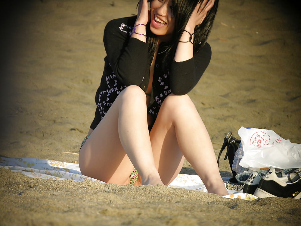 Asian on the Beach 2 porn gallery