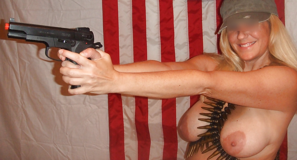 Mrs. Betty Boobman-fun with a toy gun porn gallery