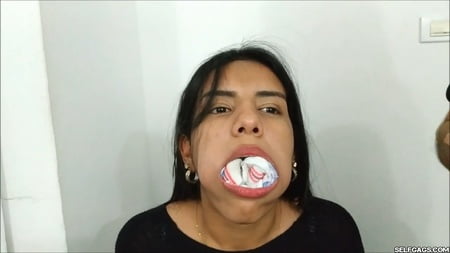 gagged with    socks and clear tape gag selfgags         