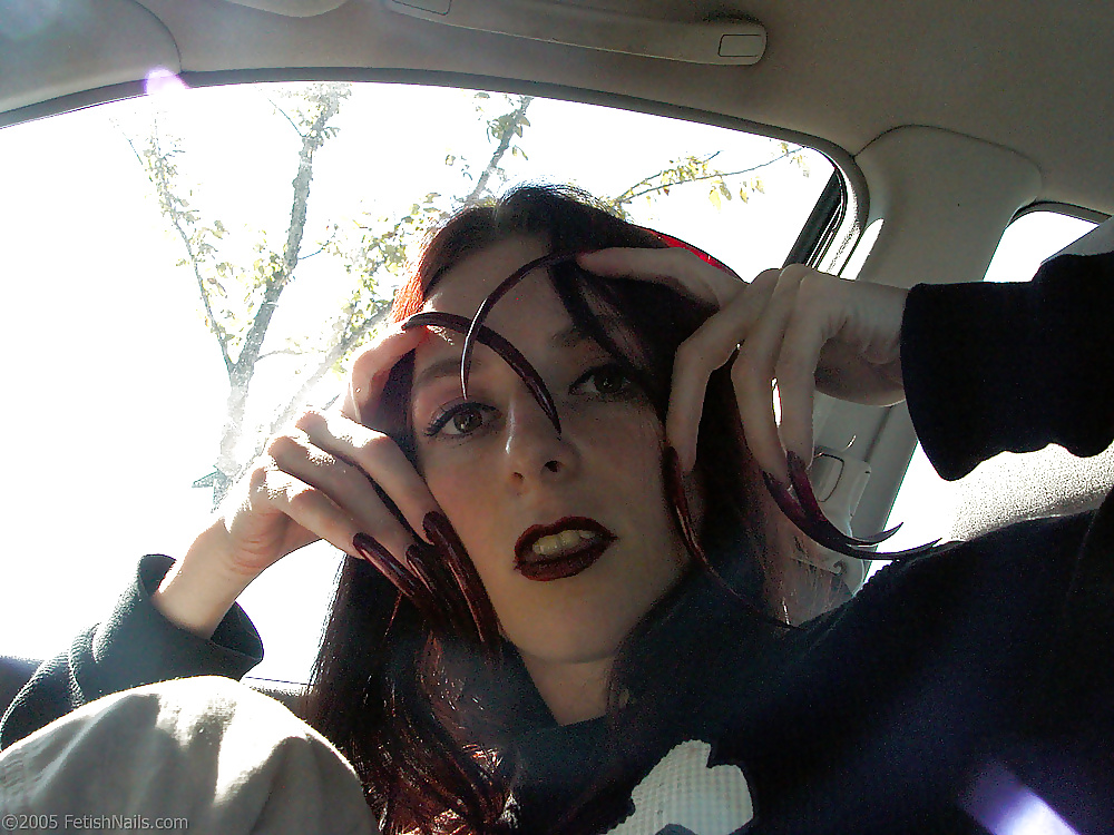 Trixie's dark red pointy extremely long claws porn gallery