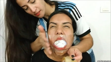 gagged with    socks and clear tape gag selfgags         