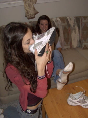girls smells shoes and sweaty feet           