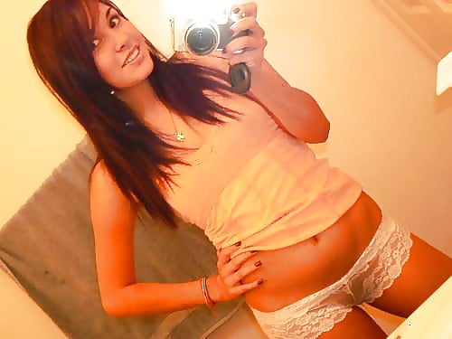 Cute teen showing off her boobs and pussy porn gallery