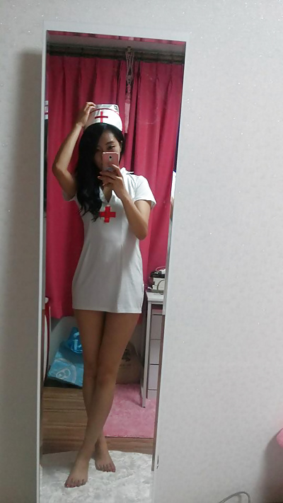 Sexy Korean Slut in Nurse Outfit porn gallery