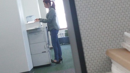 Hottie at work in jeans and heels