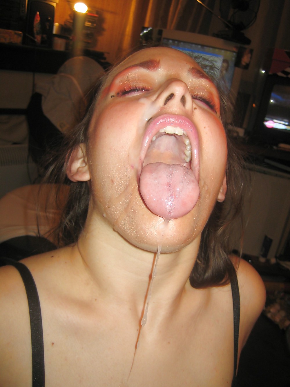 Cumshots in her open mouth - N. C. porn gallery