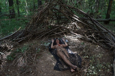 in forest cradle with apple         