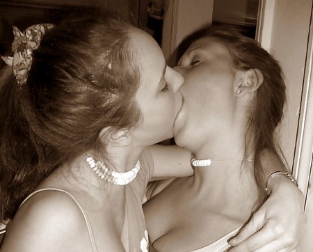 Lesbian couple Kim and Sarah in the bedroom