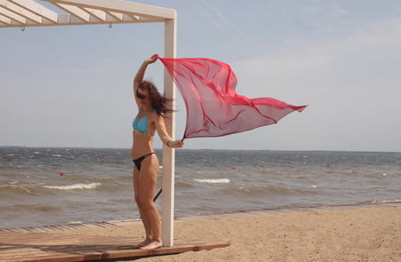 red shawl on windy weather         