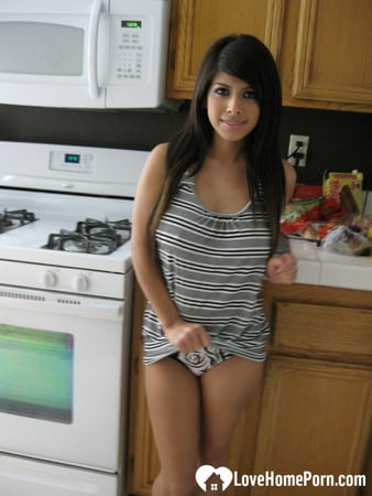 busty cutie spreads her pussy lips wide         