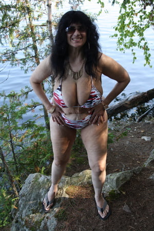 tinja expands her camo string bikini         