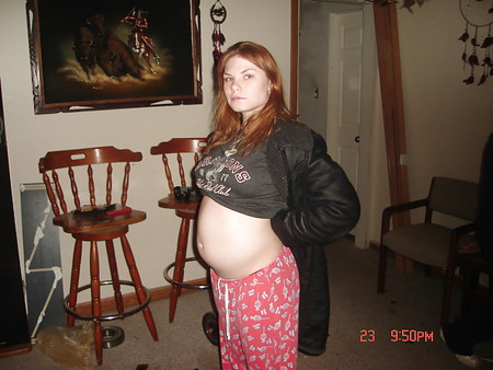 pregnant chick flashes her tits and belly