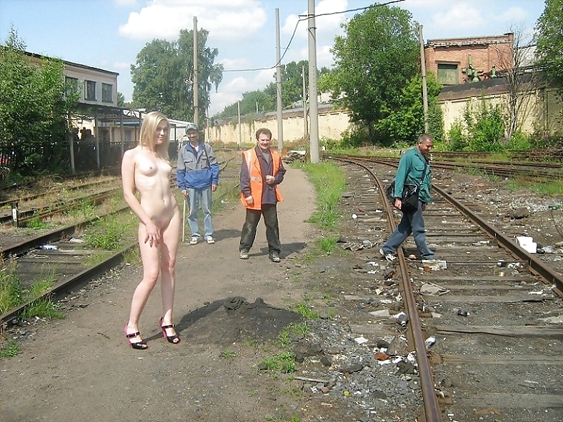 Russian girl love posing outside porn gallery