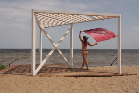 red shawl on windy weather         