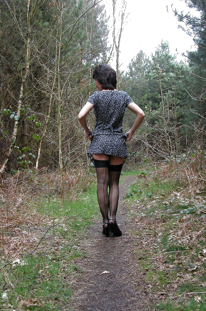 Amateur mature lady takes a walk in the woods. porn gallery