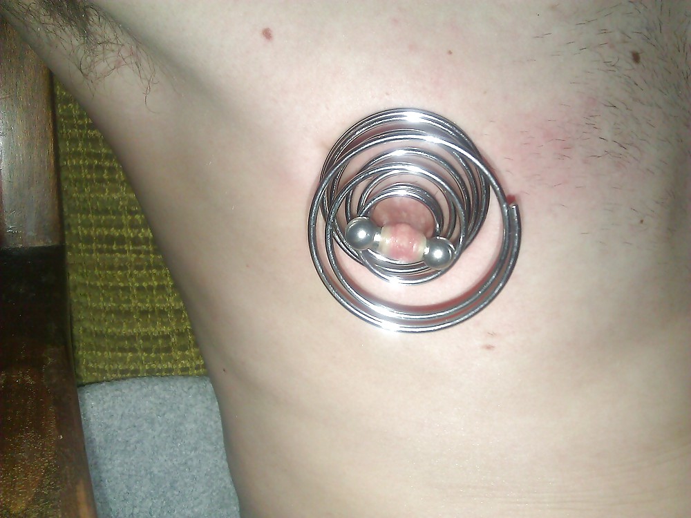 More related stretched nipple ring.